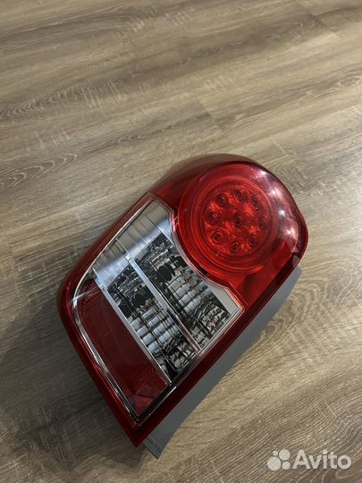 Стоп сигнал левый toyota corolla fielder 141