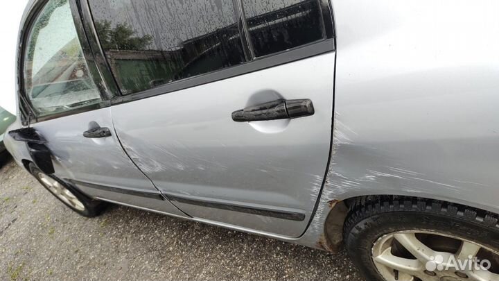 Дверь задняя левая lancer 9