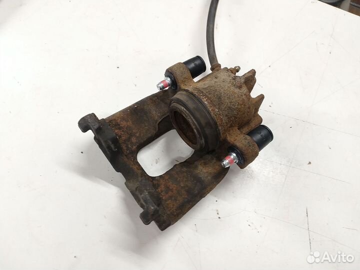 Суппорт передний левый Форд Фокус 1