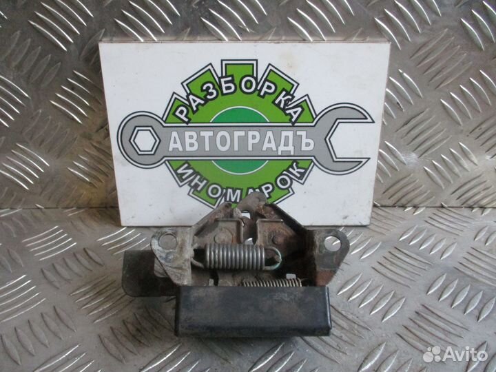 Замок капота Mazda Demio 2000г