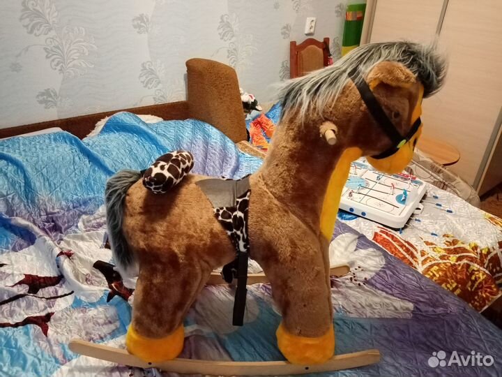 Игрушка лошадь качель