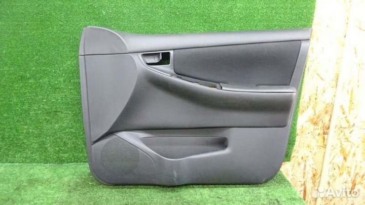 Обшивка дверей Toyota Corolla Fielder NZE124