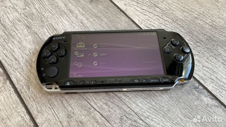 PSP 3000 + 900 игр состояние новой