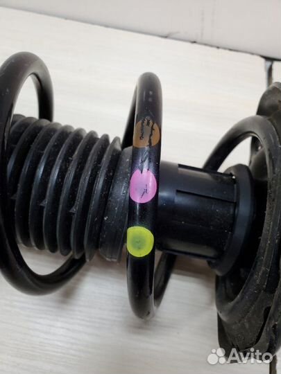 Стойка амортизатора передняя Volkswagen Tiguan 2