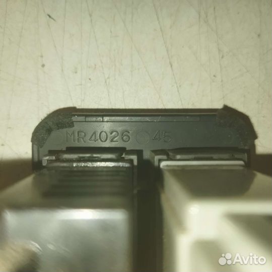 Кнопки корректора фар Mitsubishi Lancer