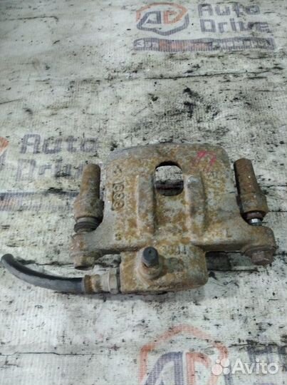 Суппорт тормозной задний правый Mitsubishi Lancer