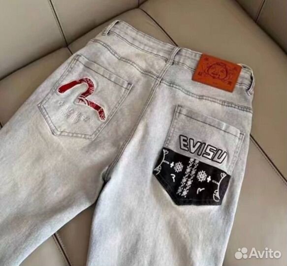 Джинсы Evisu голубые