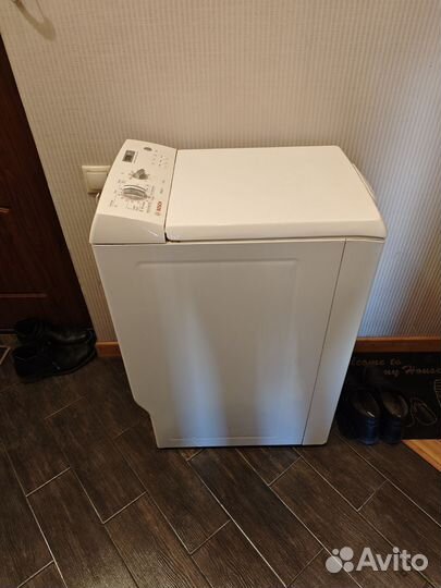 Стиральная машина с вертикальной загрузкой