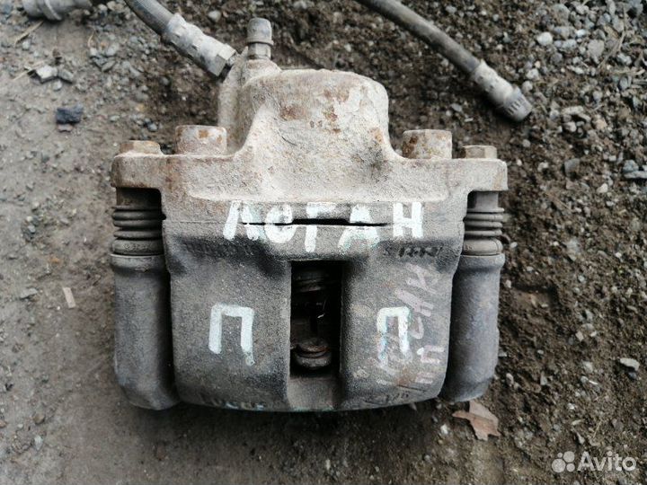 Суппорт передний правый Renault Logan LS1Y K4M