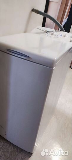 Стиральная машина с вертикальной загрузкой