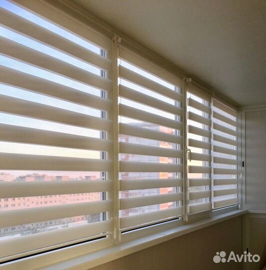 Рулонные шторы на балконные окна