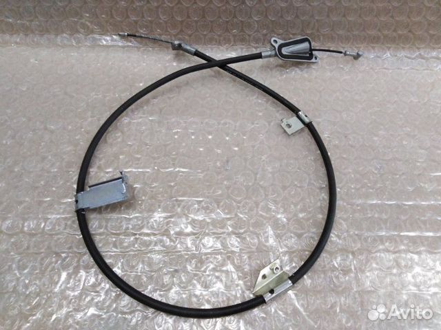 Трос стояночного тормоза задний левый Nissan