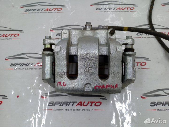 Суппорт тормозной передний левый Hyundai Staria