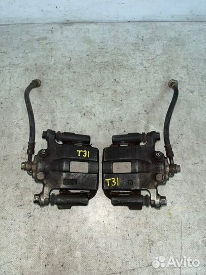 Суппорта задние пара задняя Nissan Xtrail T31