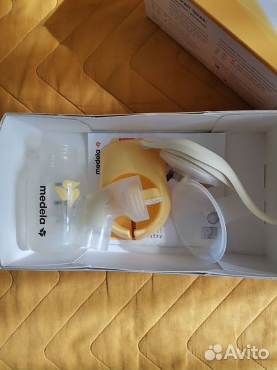 Молокоотсос medela ручной