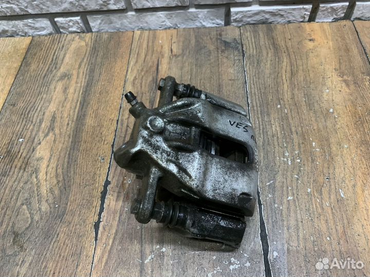 LADA Vesta Суппорт тормозной передний LH RH