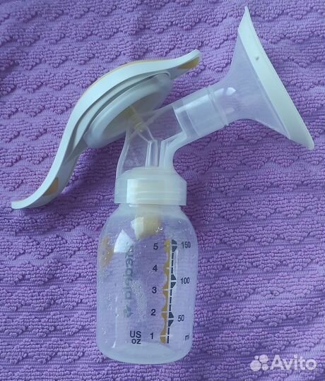 Молокоотсос medela ручной