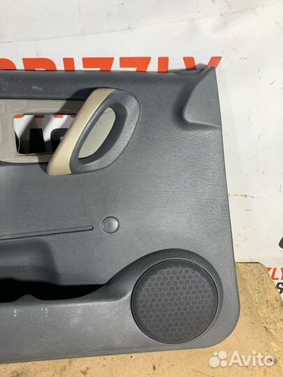 Обшивка боковой двери передняя левая Peugeot