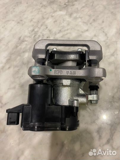 Суппорт тормозной задний левый Geely Monjaro 2021