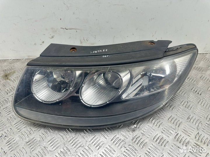Фара левая Hyundai Santa Fe (SM) рест. 2007