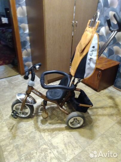 Детский трехколесный велосипед с ручкой