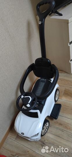 Машинка каталка с ручкой