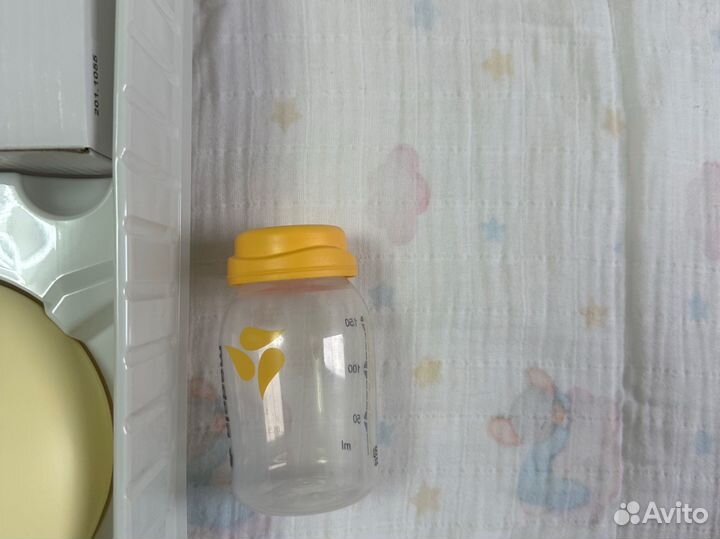 Молокоотсос medela электрический