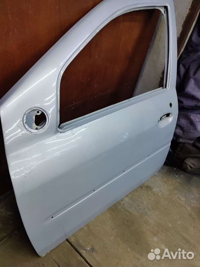 Дверь передняя левая (водителя) Renault Logan 1