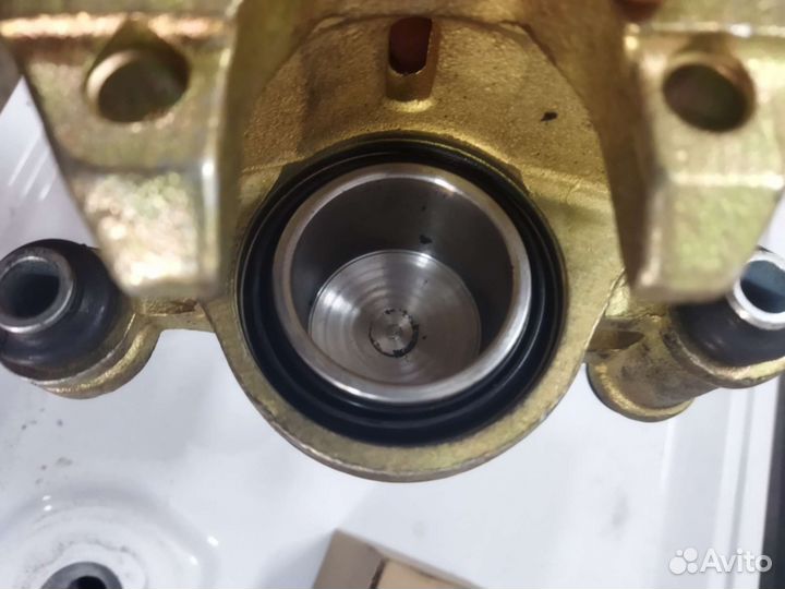 Суппорт в сборе с колодками