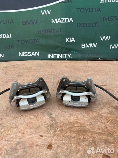 Суппорт тормозной передний Kia K5 DL3 2.5 G4KN