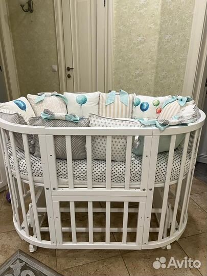 Детская кроватка трансформе с поперечным маятником