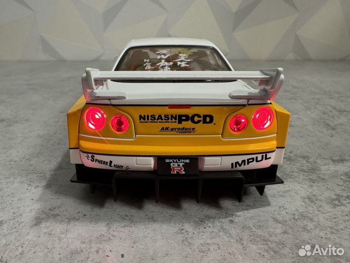 Модель авто Nissan Skyline GT-R R34 lbwk 1:24