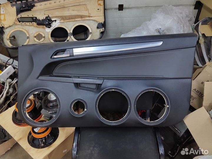 Обшивка двери подиумы Opel Astra H GTC Купе