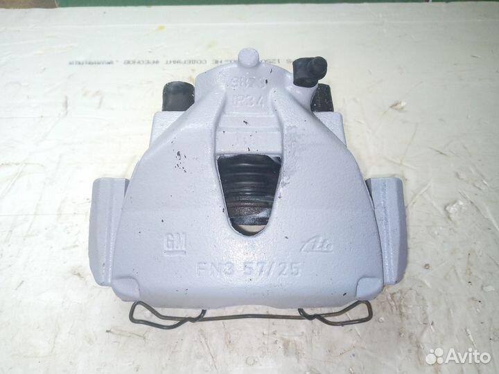 Суппорт передний левый Opel Astra H