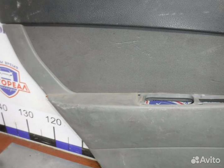 Обшивка двери задняя левая Лада Приора 21126 2011