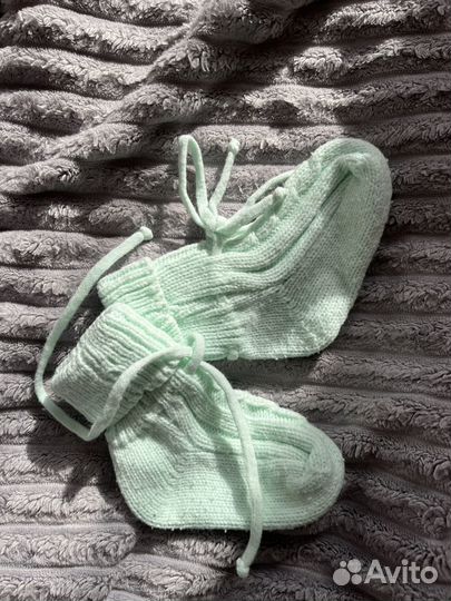 Вязанный комбинезон для новорожденного