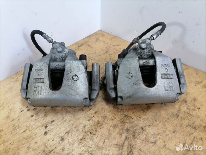 Передний тормозной суппорт Мазда 3 BK BL