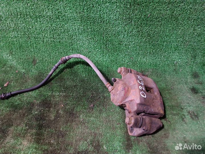 Суппорт тормозной передний Kia Spectra I рестайлин