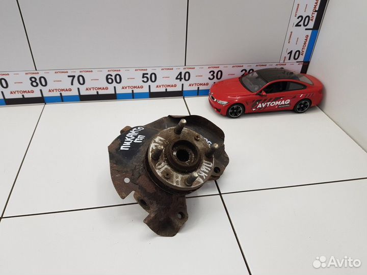 Кулак поворотный передний правый со ступицей