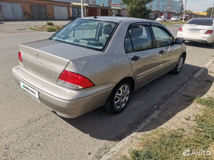 Mitsubishi Lancer 2.0 AT, 2001, 250 000 км