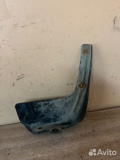 Брызговик задний правый Tiida