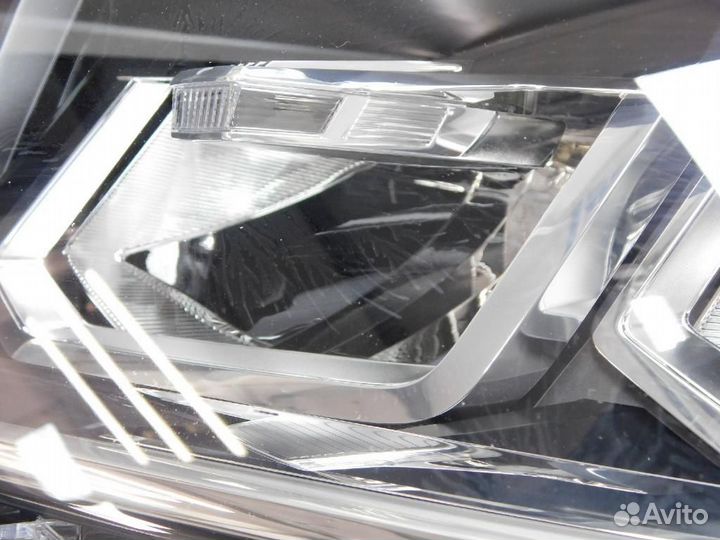 Фара левая Volkswagen Tiguan