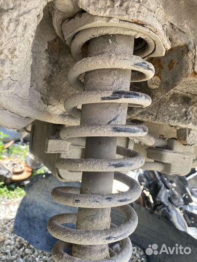 Стойка подвески задняя левая Geely Emgrand ес7