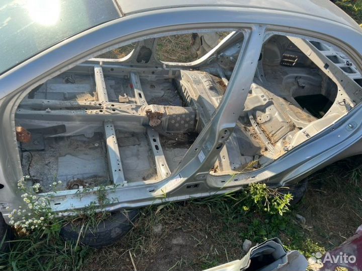 Порог кузова левый Toyota Avensis T250 седан 1