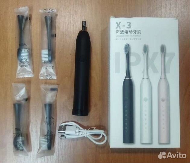 Электрическая зубная щётка с 4 насадками