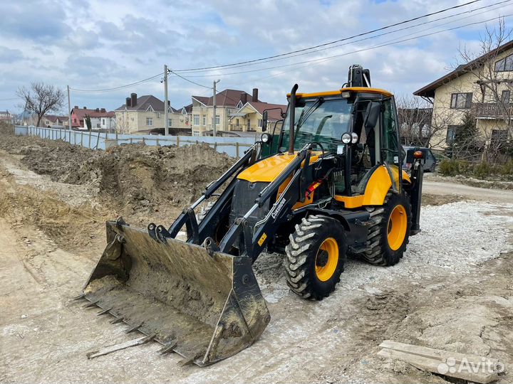 Услуги Экскаватора погрузчика (трактора)