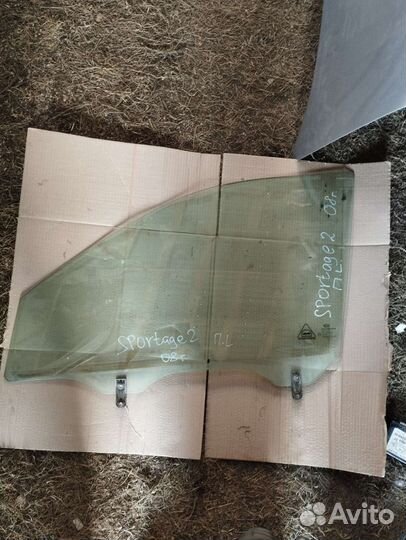 Стекло передней левой двери Kia Sportage 2