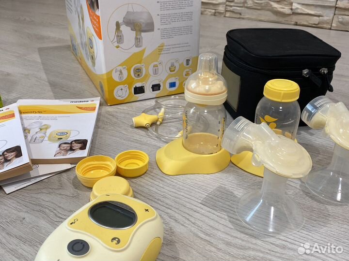 Молокоотсос medela электрический