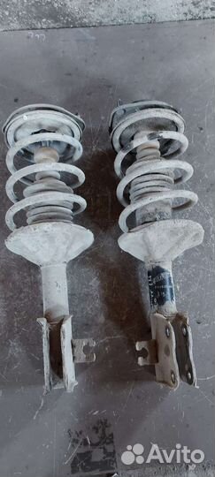 Стойка передняя Mitsubishi Mirage