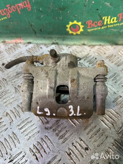 Суппорт задний левый Mitsubishi Lancer 9